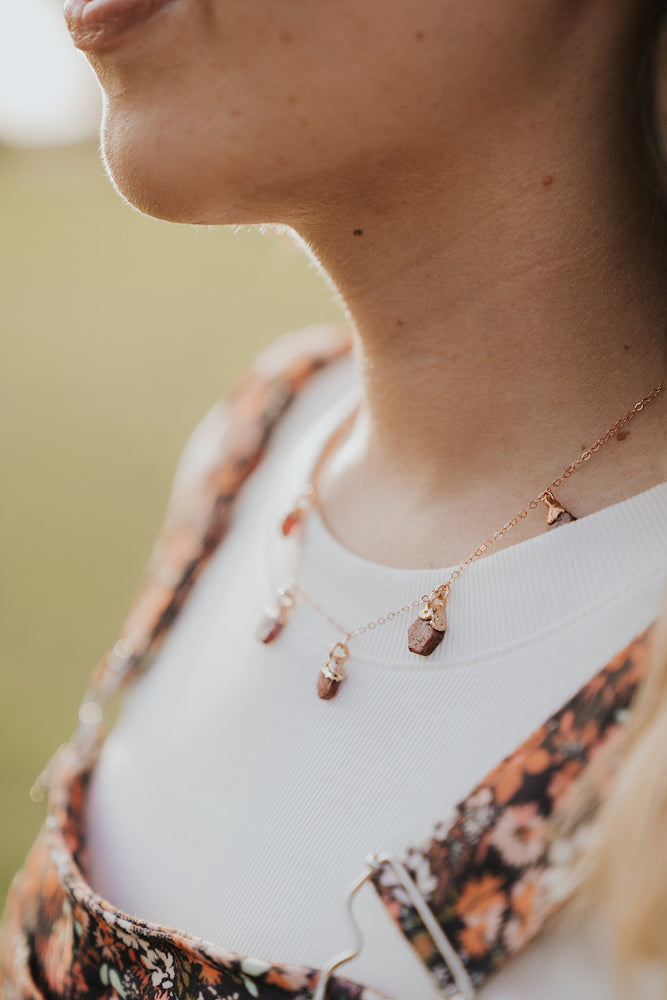 
                  
                    July Raindrops Necklace • Ruby
                  
                