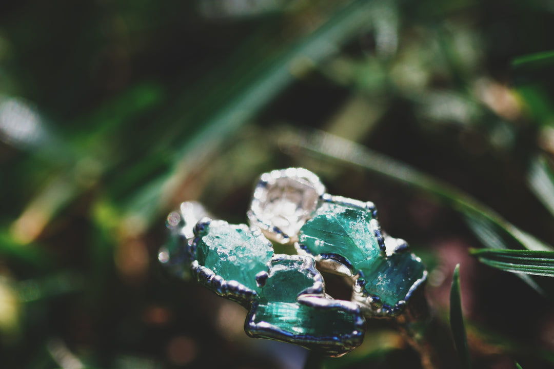 New Beginnings · Emerald and Quartz Ring